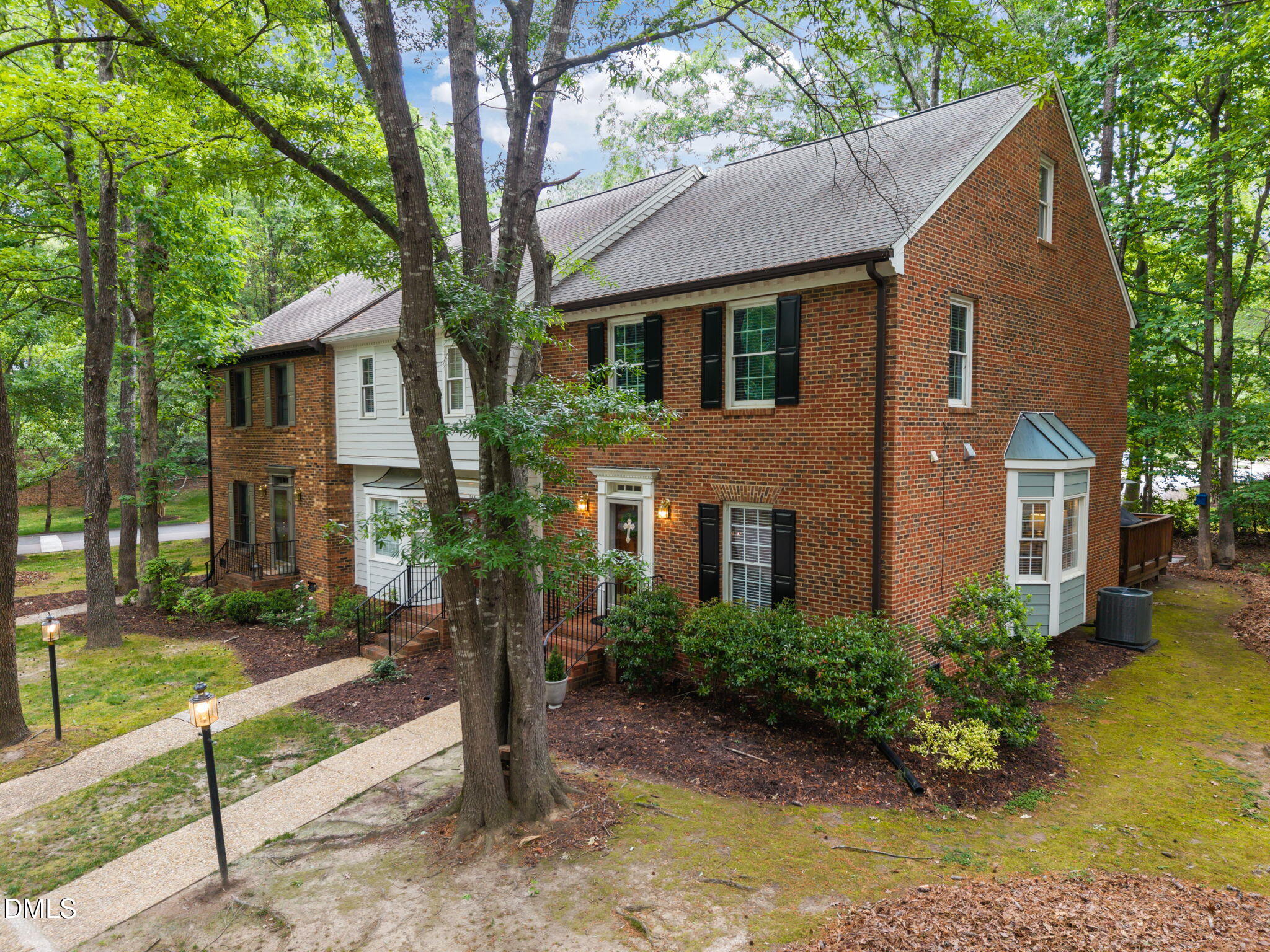 562 Weathergreen Drive Raleigh, NC 27615 - Photo 2 of 47 a front view of a house with a yard