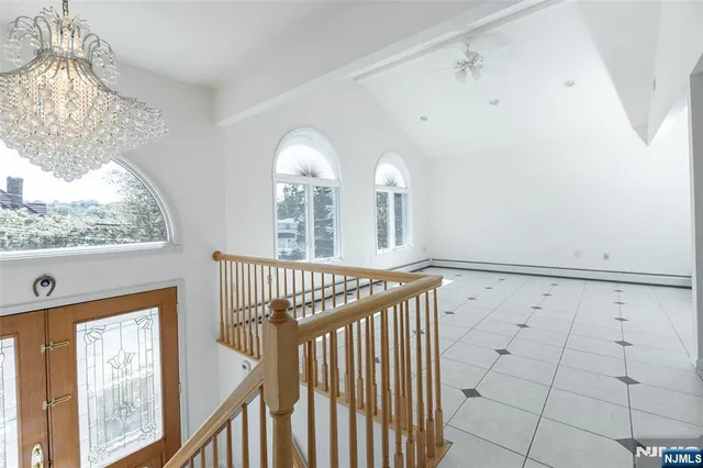 a kitchen with stainless steel appliances granite countertop a refrigerator sink and cabinets