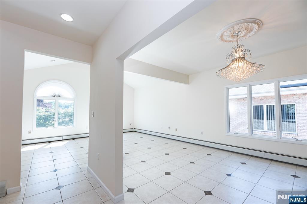 499 Morse Avenue Ridgefield, NJ 07657 - Photo 21 of 45 a view of an empty room with a window