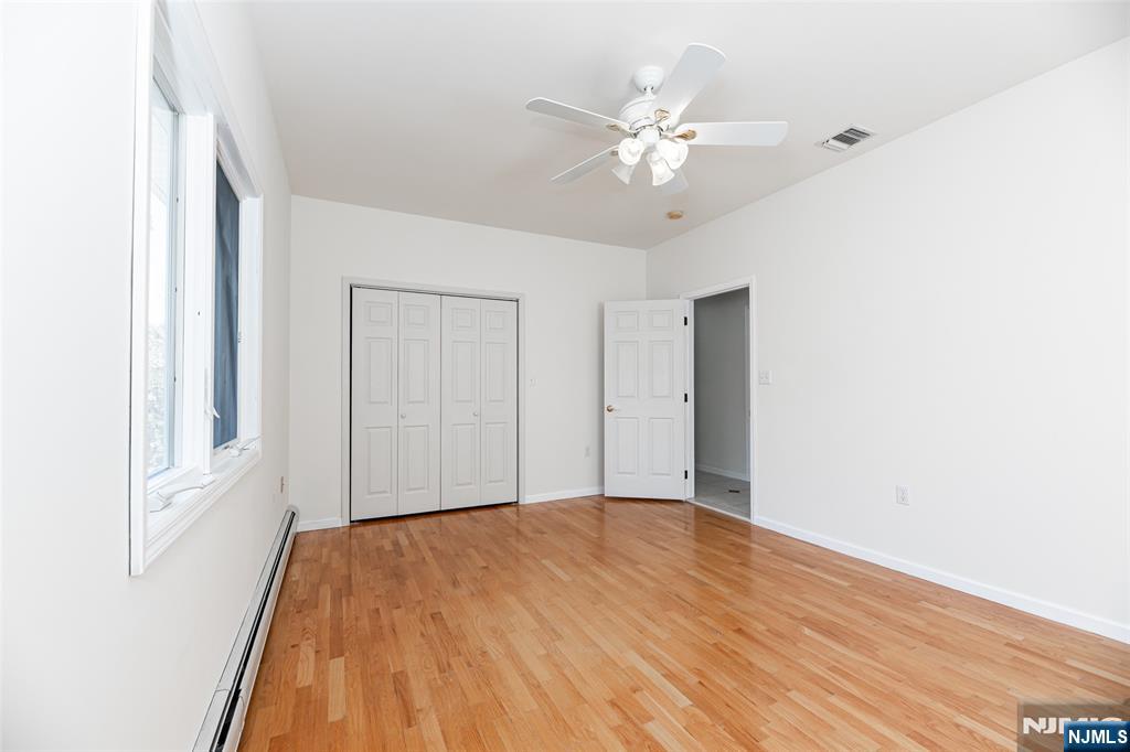 499 Morse Avenue Ridgefield, NJ 07657 - Photo 27 of 45 a view of empty room with wooden floor