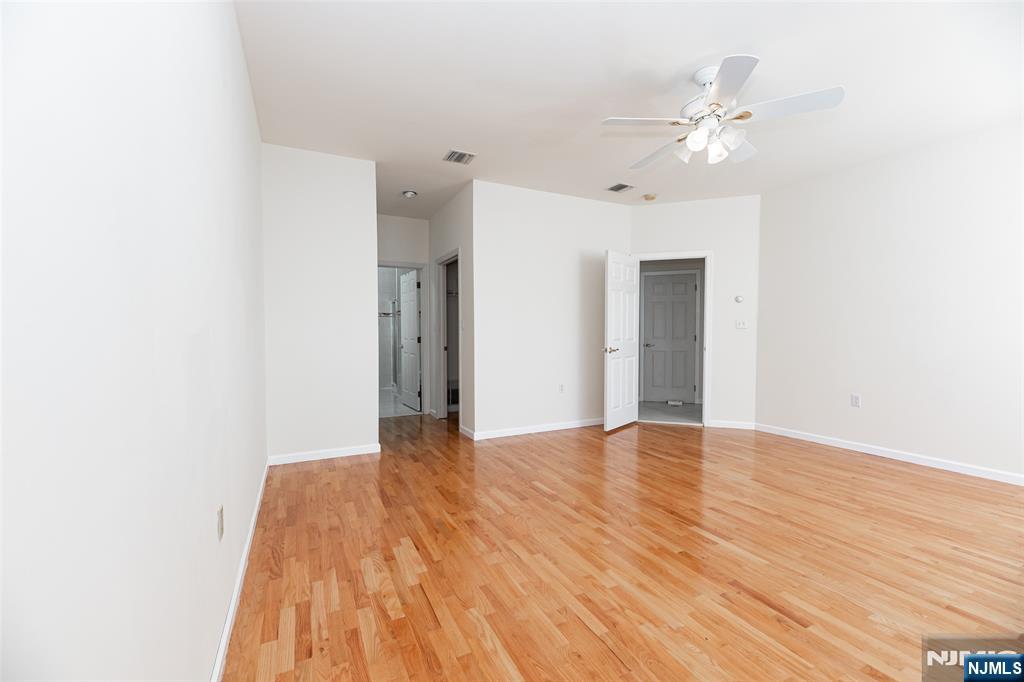 499 Morse Avenue Ridgefield, NJ 07657 - Photo 30 of 45 a view of an empty room with wooden floor