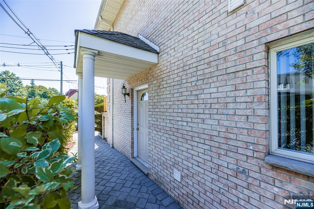 499 Morse Avenue Ridgefield, NJ 07657 - Photo 42 of 45 a view of a pathway besides a house