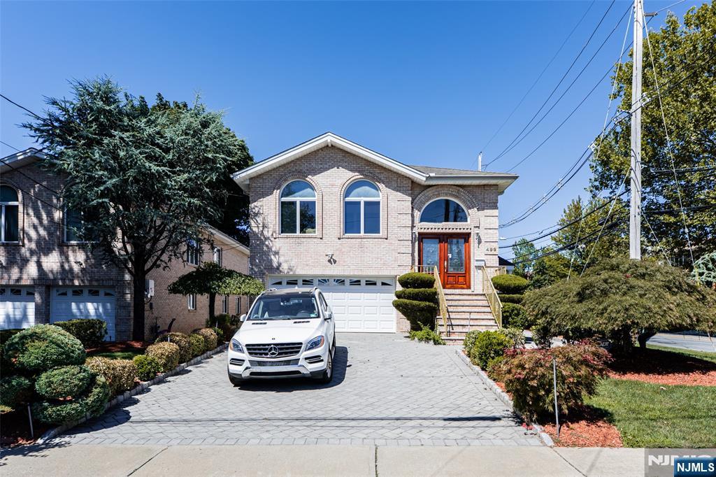 499 Morse Avenue Ridgefield, NJ 07657 - Photo 43 of 45 a car parked in front of a house