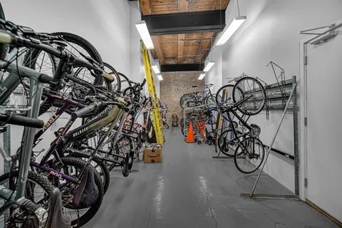 a view of a street with a building in the background