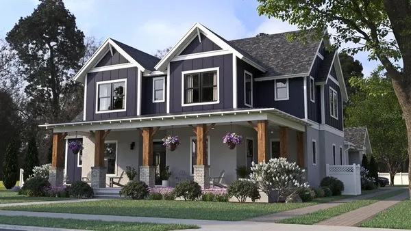 a front view of a house with garden