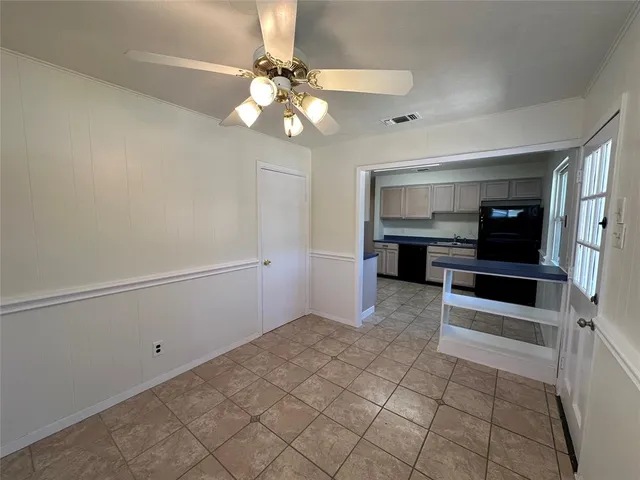 a view of a livingroom with a furniture