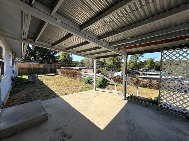 a view of swimming pool with a yard