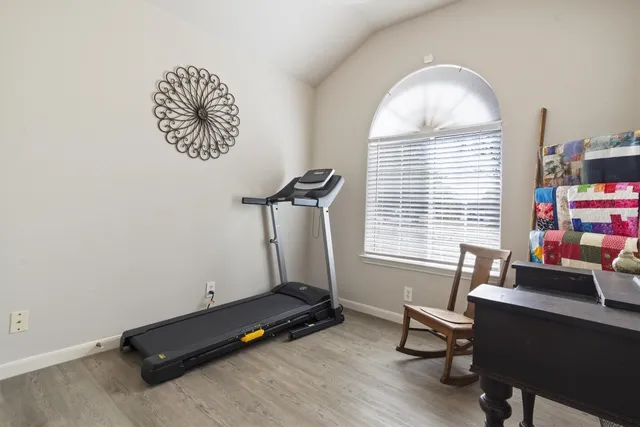 a room with furniture and a window