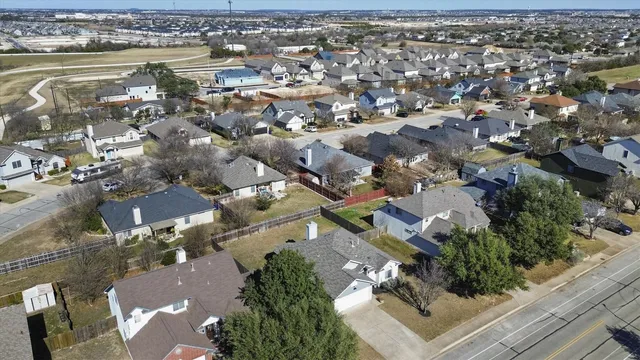 an aerial view of a city with lots of residential buildings