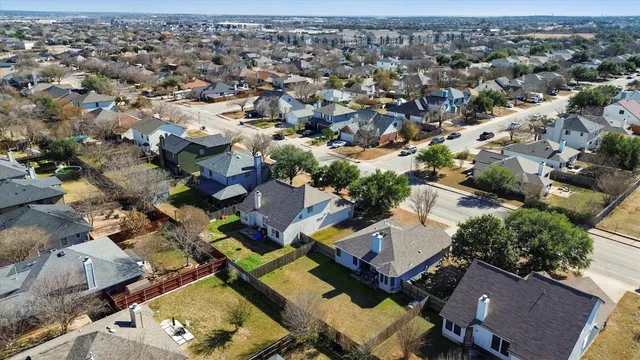 an aerial view of a city with lots of residential buildings