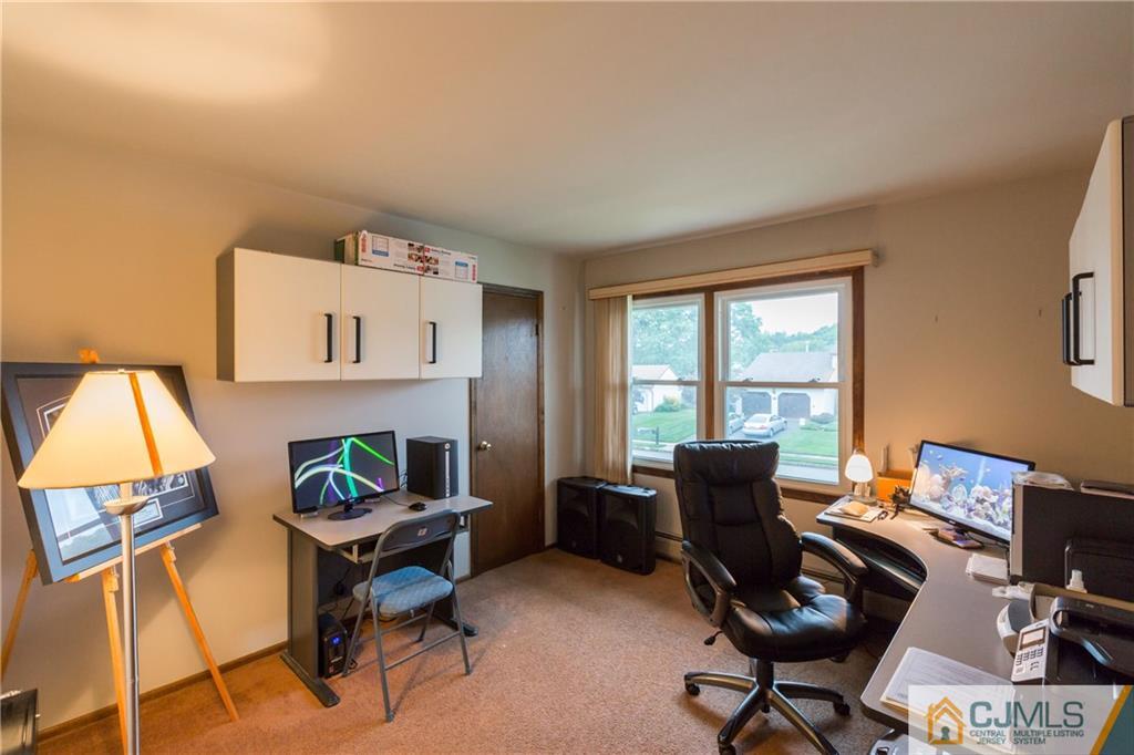 64 Higgins Road Old Bridge, NJ 08857 - Photo 14 of 25 a work room with furniture and a window