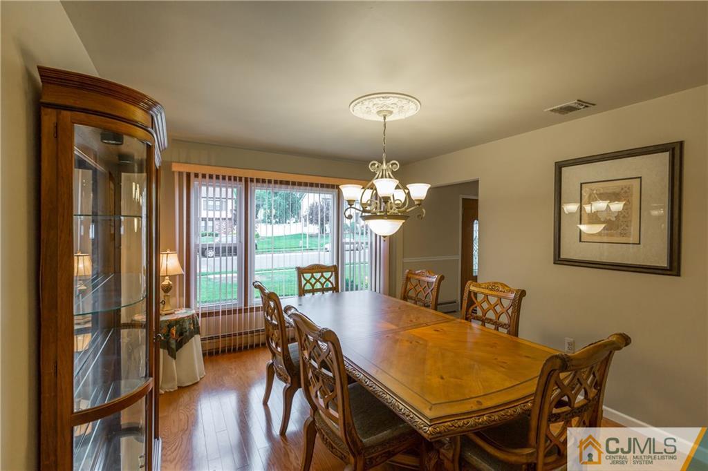 64 Higgins Road Old Bridge, NJ 08857 - Photo 3 of 25 a view of a dining room with furniture window and outside view