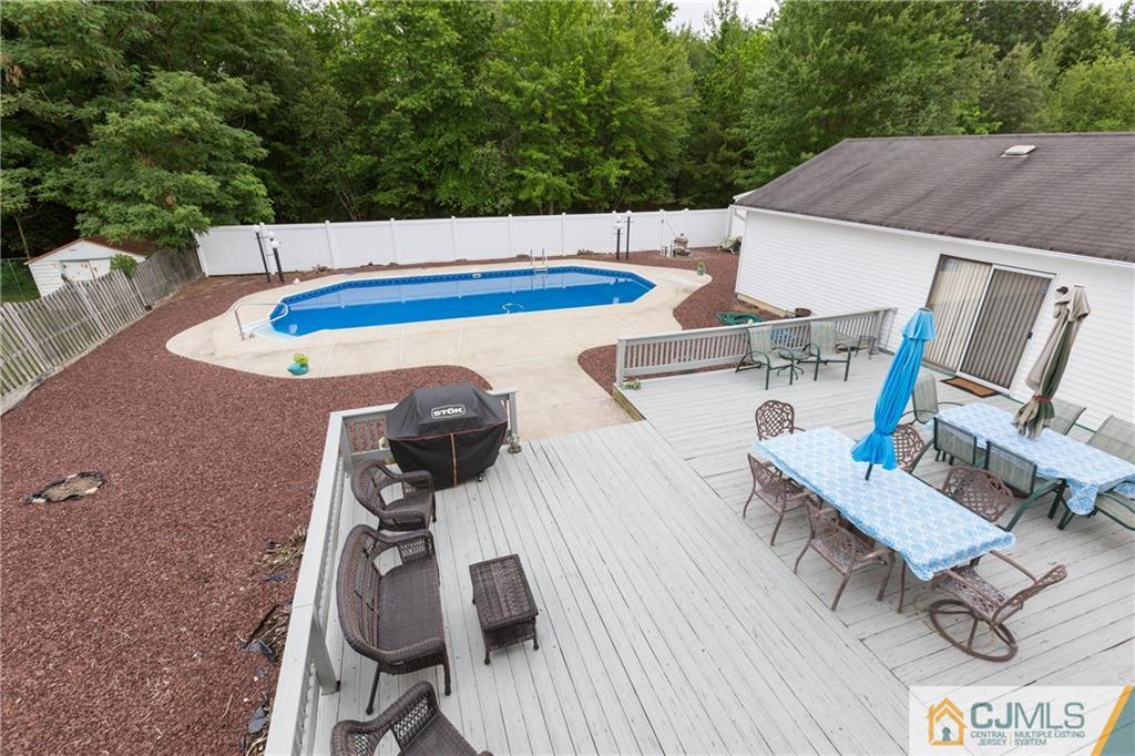 64 Higgins Road Old Bridge, NJ 08857 - Photo 22 of 25 a view of deck and patio