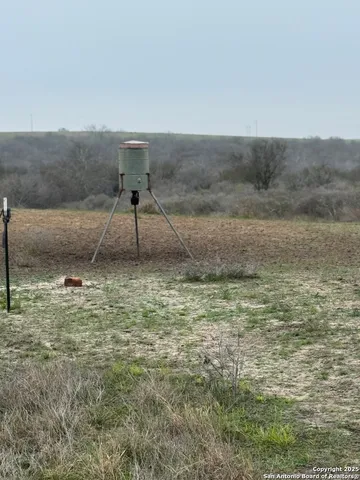 a view of a lake with a beach