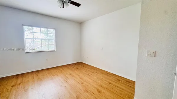 an empty room with window