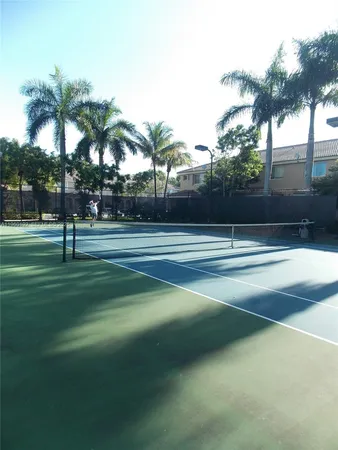 a sign that is on a brick wall