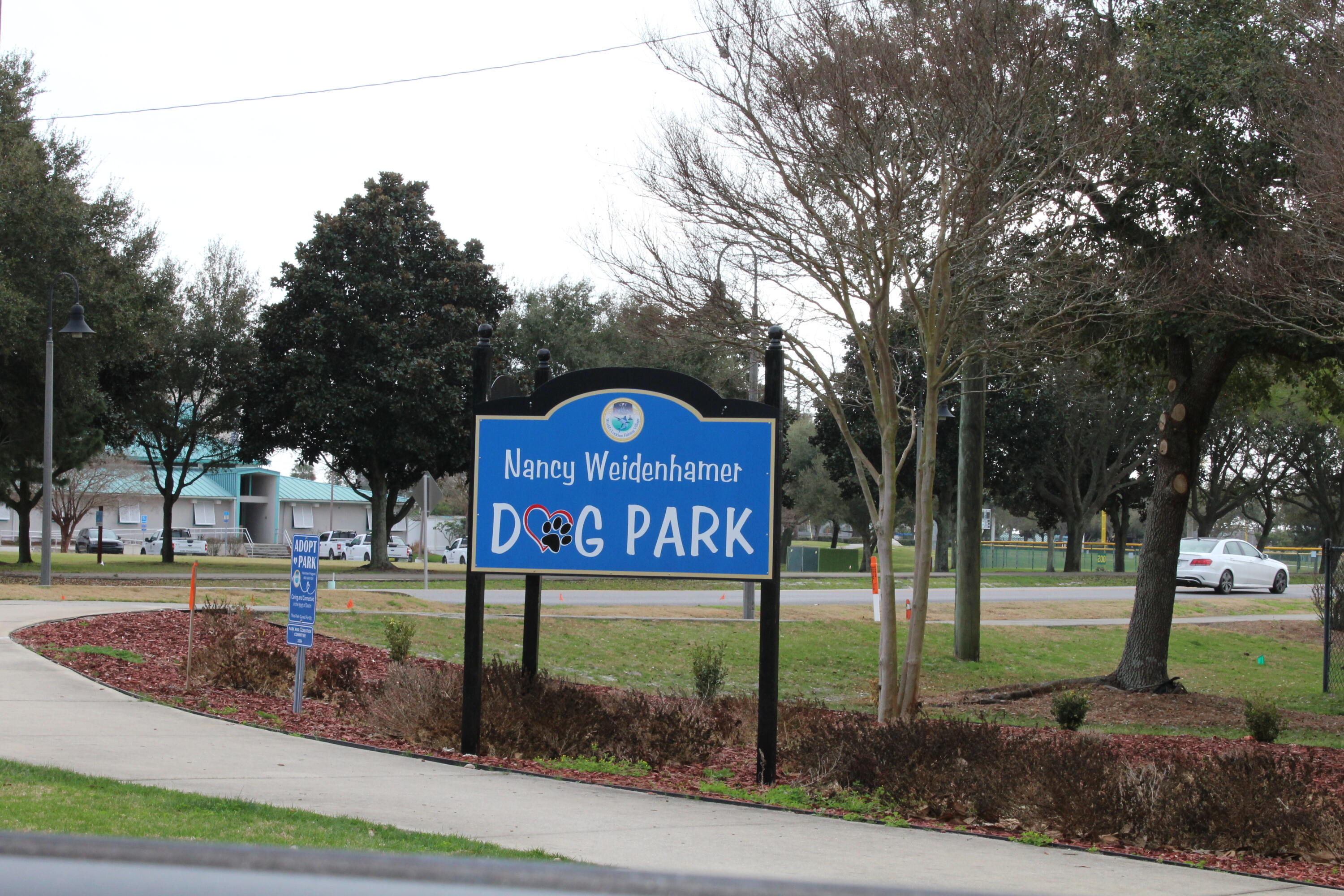 4080 Dancing Cloud Court, Unit 218 Destin, FL 32541 - Photo 27 of 28 a view of street with benches and trees