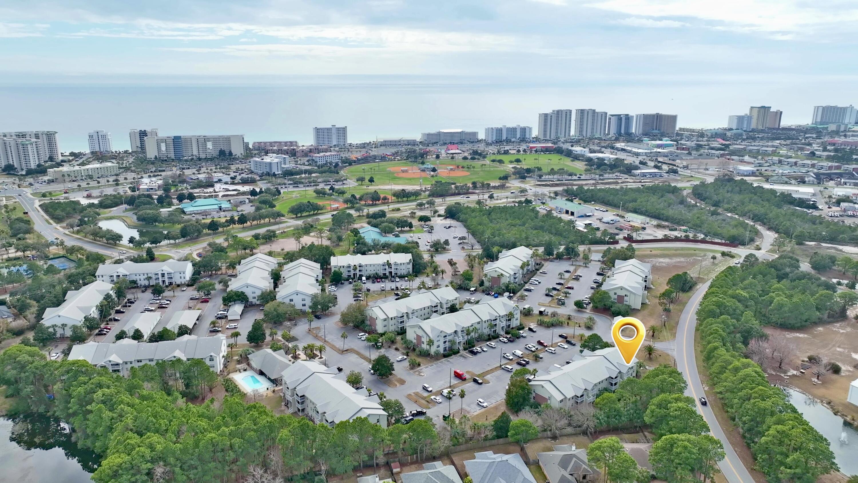 4080 Dancing Cloud Court, Unit 218 Destin, FL 32541 - Photo 5 of 28 an aerial view of a city with lots of residential buildings