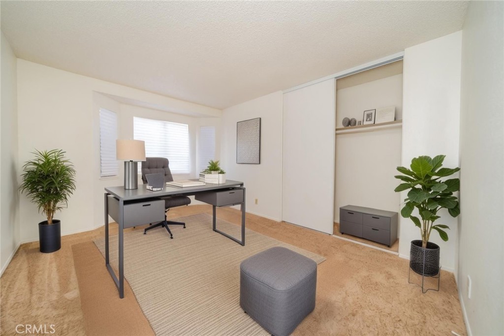 1385 West Wedgewood Street Rialto, CA 92376 - Photo 13 of 27 a living room with furniture and a potted plant