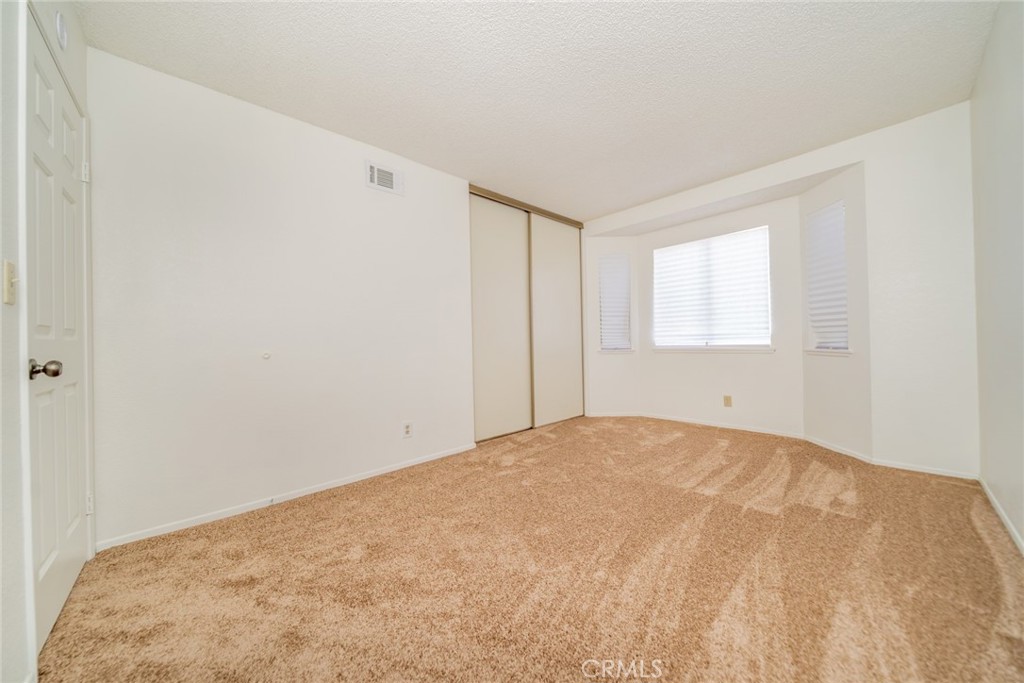 1385 West Wedgewood Street Rialto, CA 92376 - Photo 20 of 27 a view of empty room with window