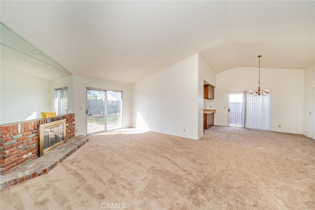 1385 West Wedgewood Street Rialto, CA 92376 - Photo 6 of 27 a view of a livingroom with furniture and windows