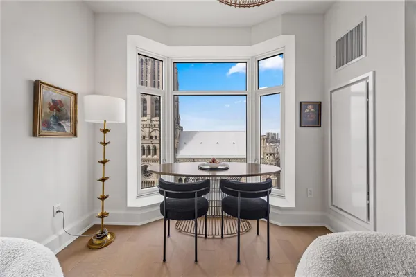 a view of a livingroom with furniture and window