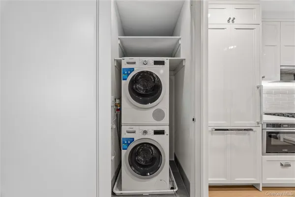 a utility room with dryer and washer
