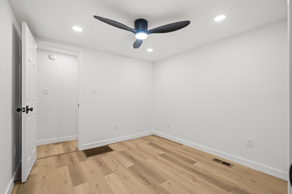 514 Ash Loop Road Blue Ridge, GA 30513 - Photo 18 of 24 wooden floor in an empty room