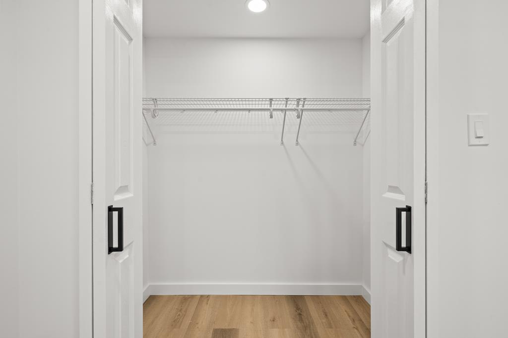 514 Ash Loop Road Blue Ridge, GA 30513 - Photo 19 of 24 a view of walk in closet with empty racks