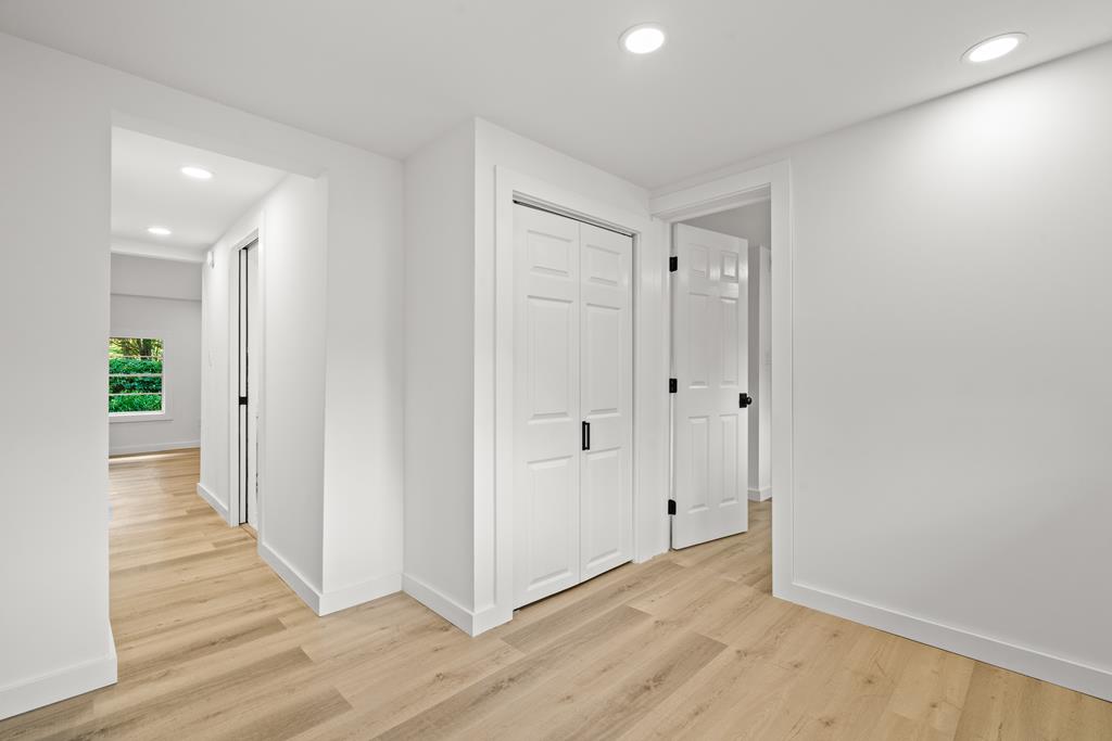 514 Ash Loop Road Blue Ridge, GA 30513 - Photo 22 of 24 a view of a hallway with wooden floor