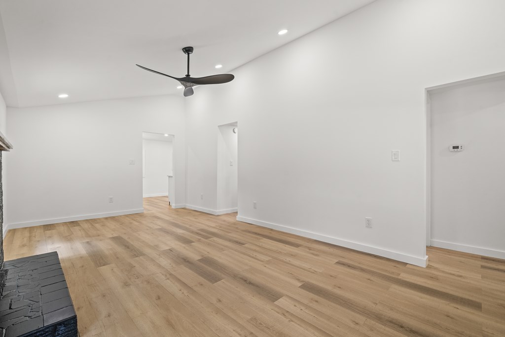 514 Ash Loop Road Blue Ridge, GA 30513 - Photo 8 of 24 a view of a room with wooden floor and ceiling fan