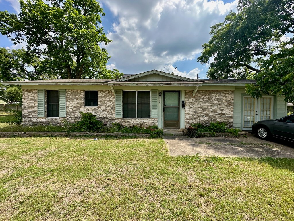 2211 Doris Drive Austin, TX 78757 - Photo 1 of 1 a front view of a house with garden