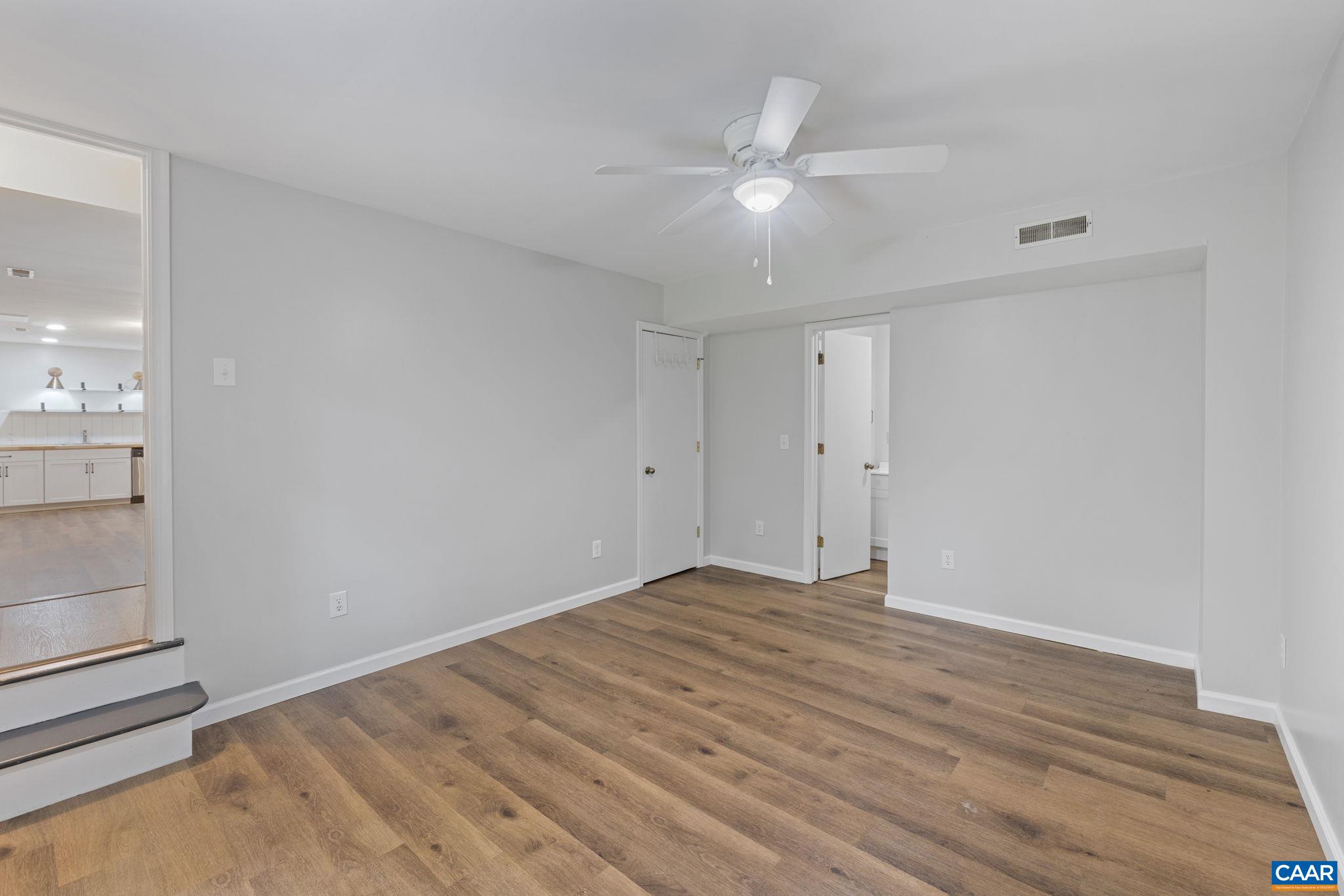 13 Axle Tree Road Palmyra, VA 22963 - Photo 58 of 71 a view of an empty room with wooden floor
