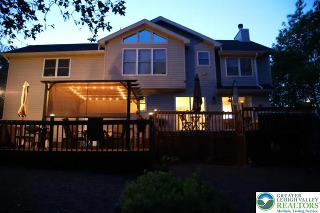 a front view of a house with yard