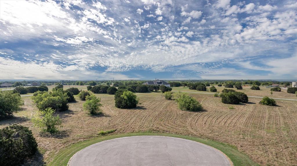 7308 Castle Royle Court Cleburne, TX 76033 - Photo 3 of 35 Drone / aerial view with a rural view