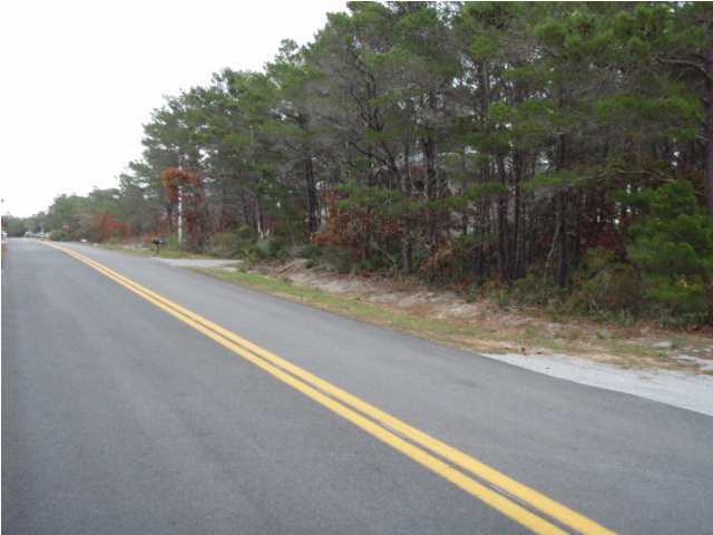 Lot 4 Maple Street Santa Rosa Beach, FL 32459 - Photo 1 of 15 a view of a yard with large trees