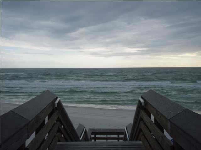 Lot 4 Maple Street Santa Rosa Beach, FL 32459 - Photo 9 of 15 a view of roof with two chair and wooden floor