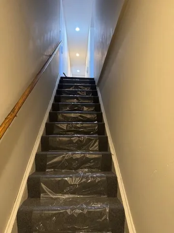 a view of a bathroom from the hallway