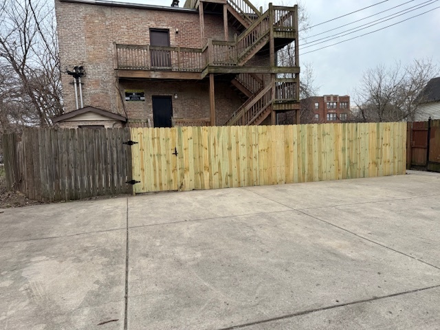 6418-20 South Stewart Avenue Chicago, IL 60621 - Photo 39 of 41 a front view of a house with a garage