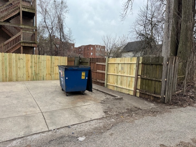 6418-20 South Stewart Avenue Chicago, IL 60621 - Photo 41 of 41 a view of backyard with wooden fence
