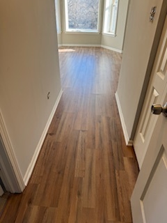 6418-20 South Stewart Avenue Chicago, IL 60621 - Photo 7 of 41 a view of a hallway with wooden floor and staircase