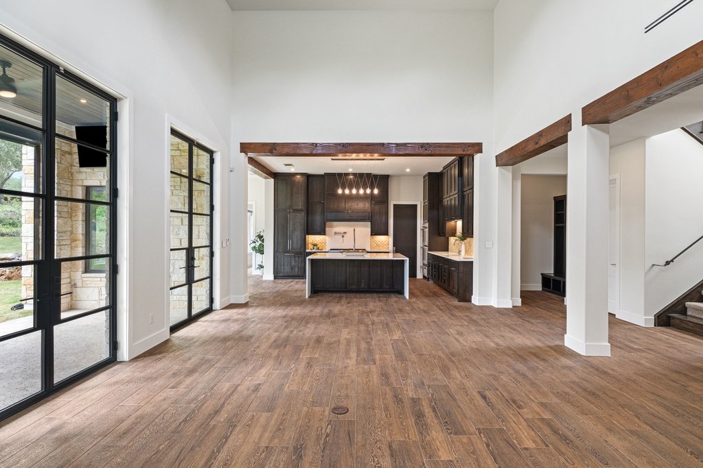 11002 Foundation Road Austin, TX 78726 - Photo 12 of 40 a view of a big room with wooden floor and furniture