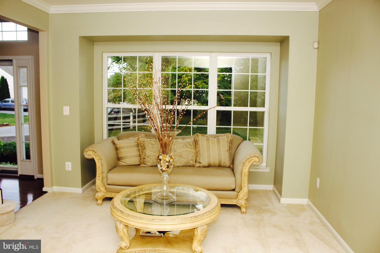 1322 North Rolling Road Baltimore, MD 21228 - Photo 13 of 30 a living room with furniture and a large window