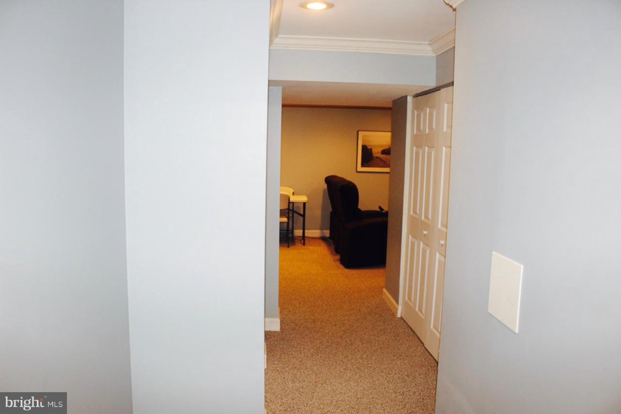 1322 North Rolling Road Baltimore, MD 21228 - Photo 17 of 30 a view of a hallway with a living room