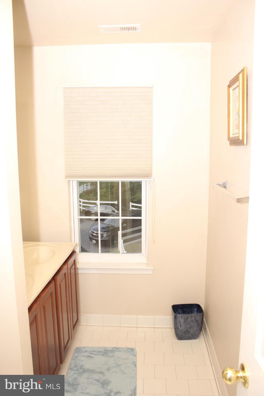 1322 North Rolling Road Baltimore, MD 21228 - Photo 30 of 30 a view of a hallway with windows