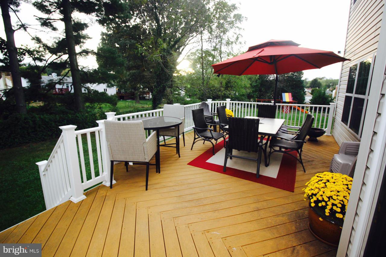 1322 North Rolling Road Baltimore, MD 21228 - Photo 4 of 30 a view of a roof deck with furniture