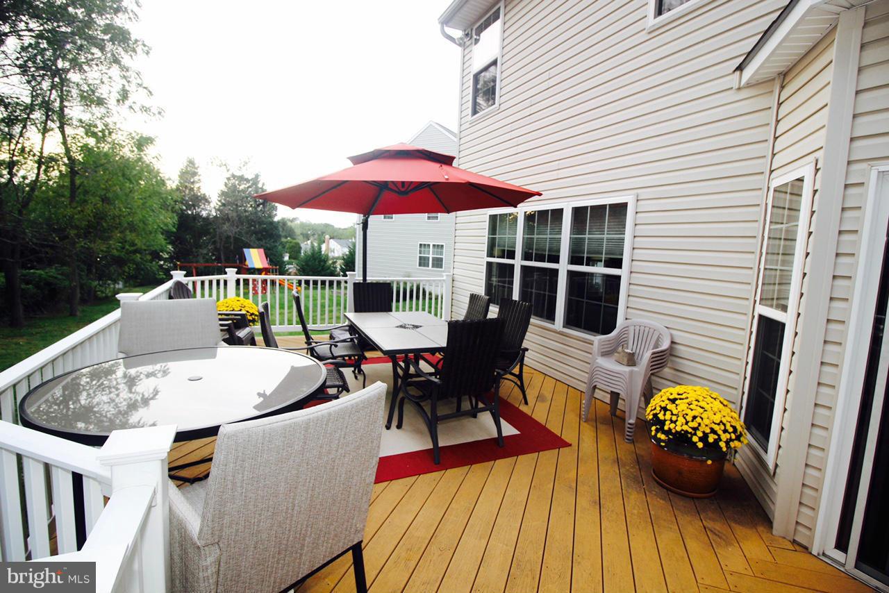 1322 North Rolling Road Baltimore, MD 21228 - Photo 5 of 30 a view of balcony with outdoor seating