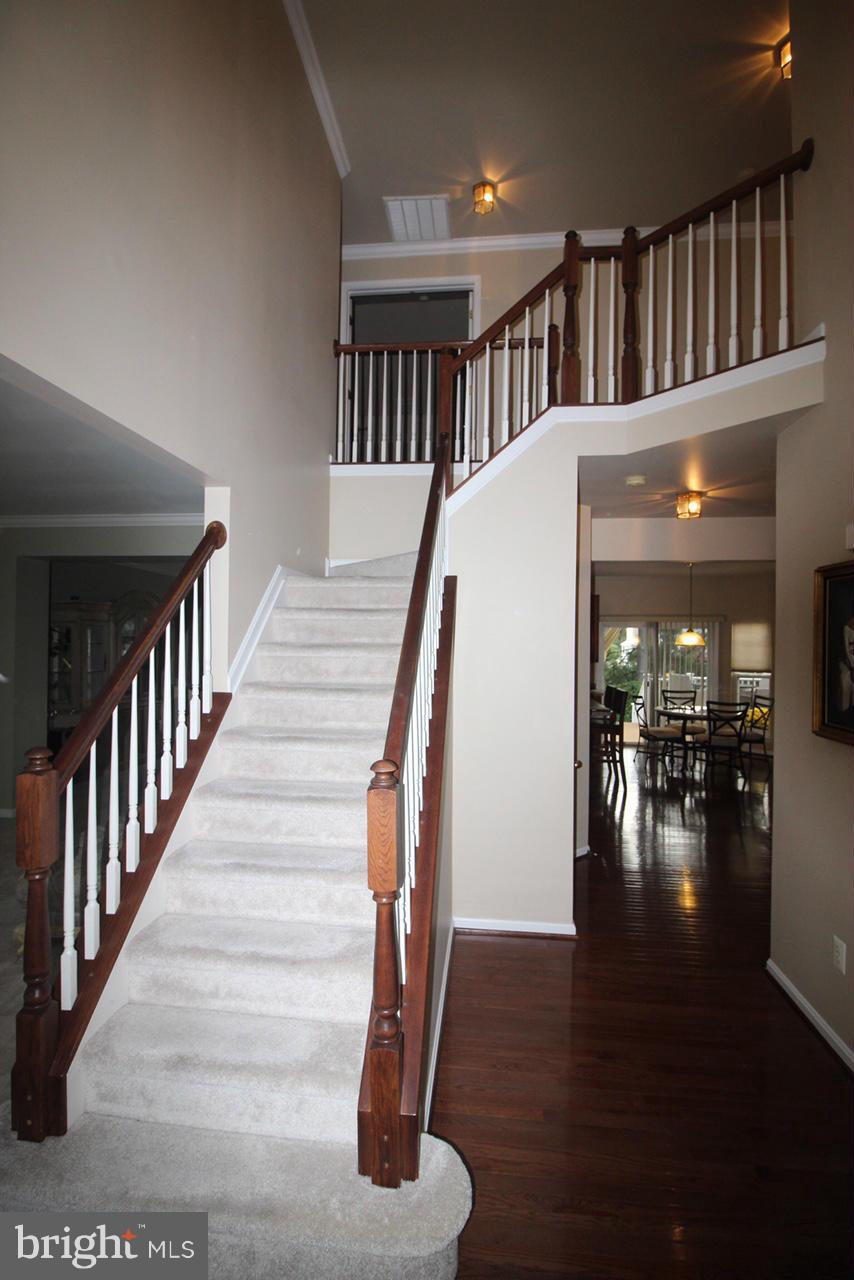 1322 North Rolling Road Baltimore, MD 21228 - Photo 7 of 30 a view of entryway and hall with wooden floor