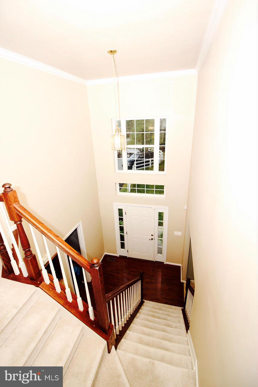 1322 North Rolling Road Baltimore, MD 21228 - Photo 8 of 30 a view of staircase with rug