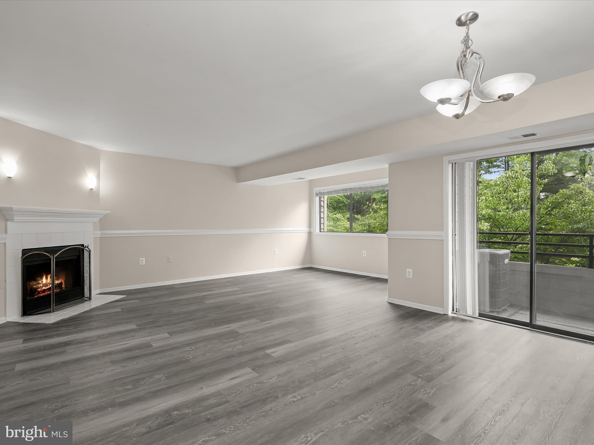 6909 Jones View Drive, Unit 3A Baltimore, MD 21209 - Photo 4 of 42 Living and Dining Rooms